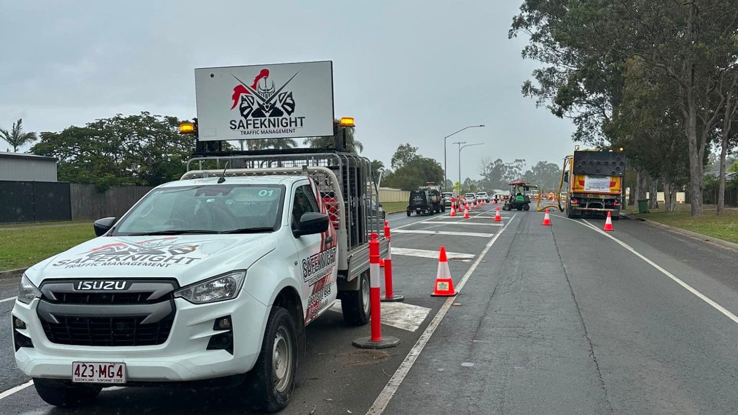 Safe Knight traffic management ute with roof sign at a lane closure